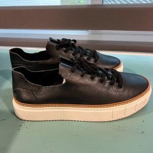 Vince Canuto black sneakers.